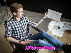 A0TattooedTomas